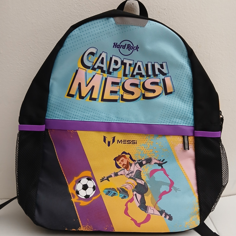 Hard Rock Cafe Kids Backpack - Light Blue, Purple & Yellow Captain Messi $18